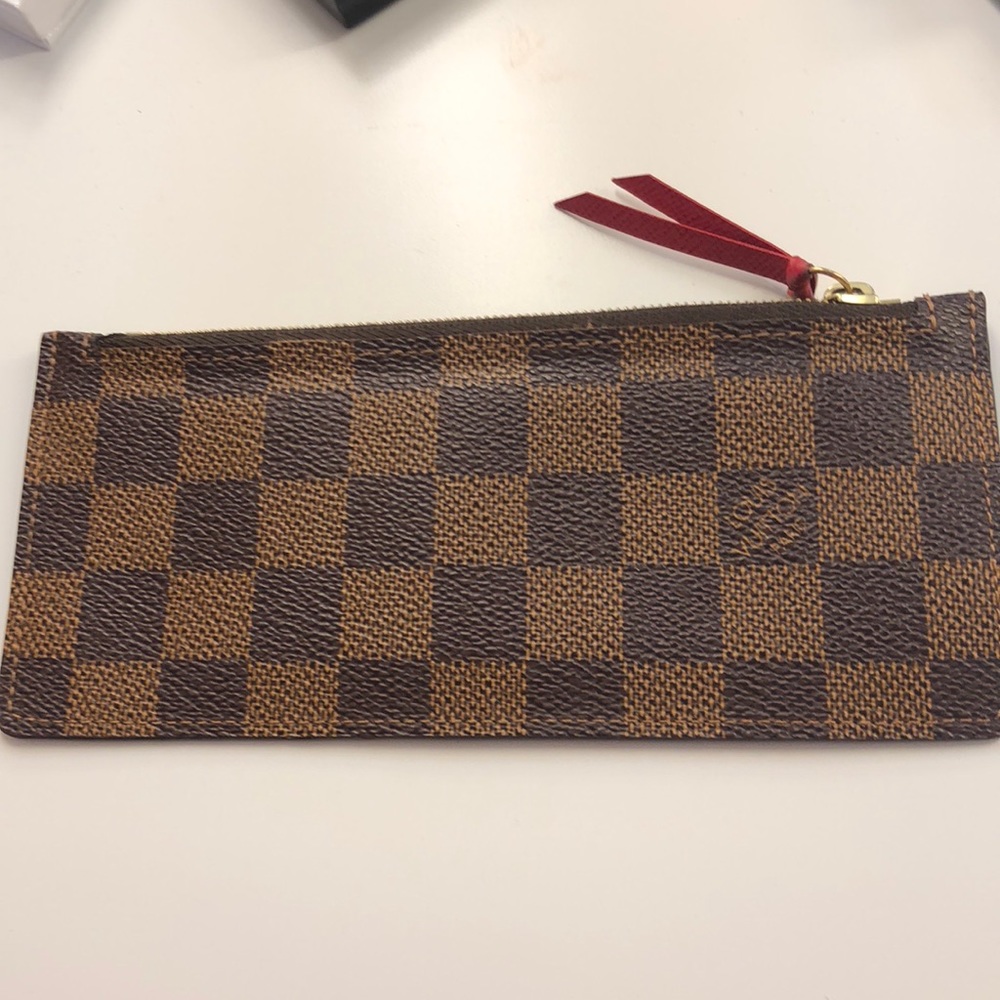 LV Pouch good for debit/credit Cards.